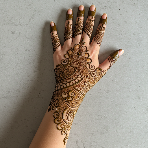 A simple, elegant vine trails along the wrist