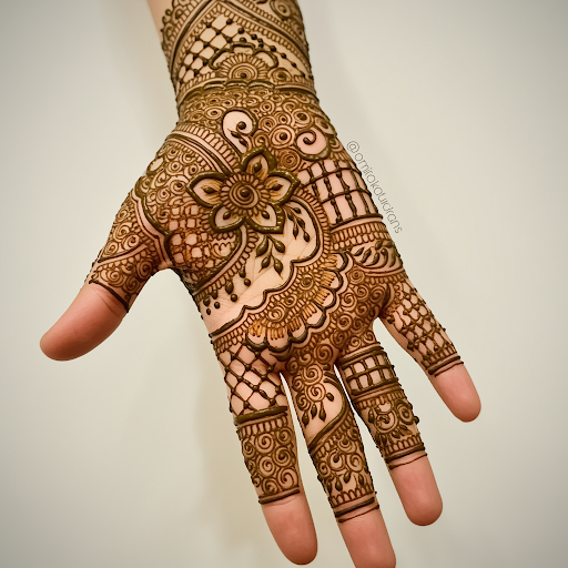 Henna art that flows with the contours of the body